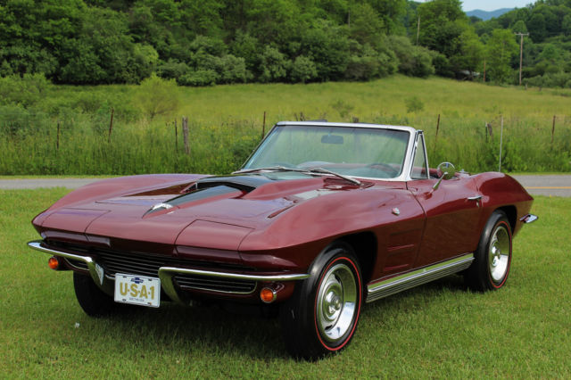 1964 maroon Chevrolet Corvette Convertible