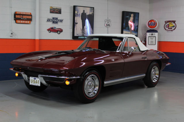 1964 maroon Chevrolet Corvette Convertible