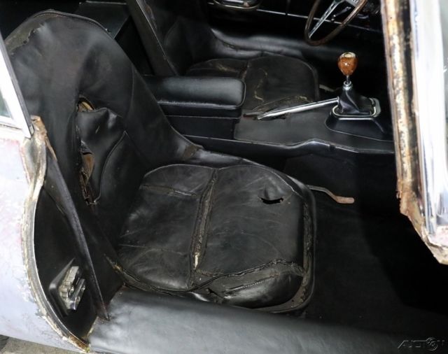 1964 Yellow Jaguar E-Type Coupe