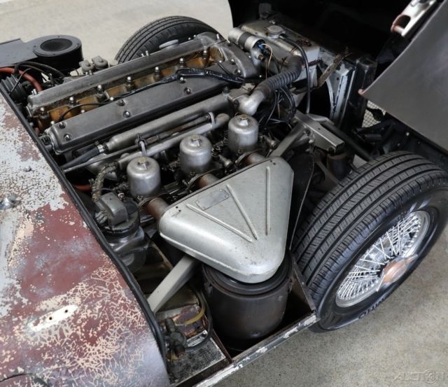 1964 Yellow Jaguar E-Type Coupe