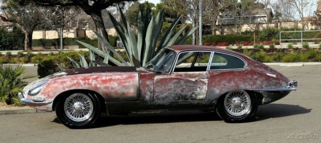 1964 Yellow Jaguar E-Type Coupe