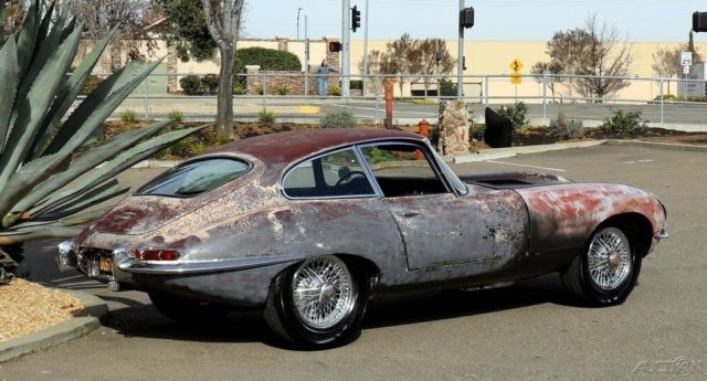 1964 Yellow Jaguar E-Type Coupe