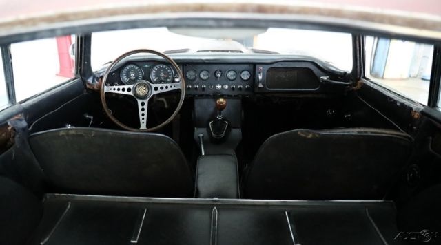 1964 Yellow Jaguar E-Type Coupe
