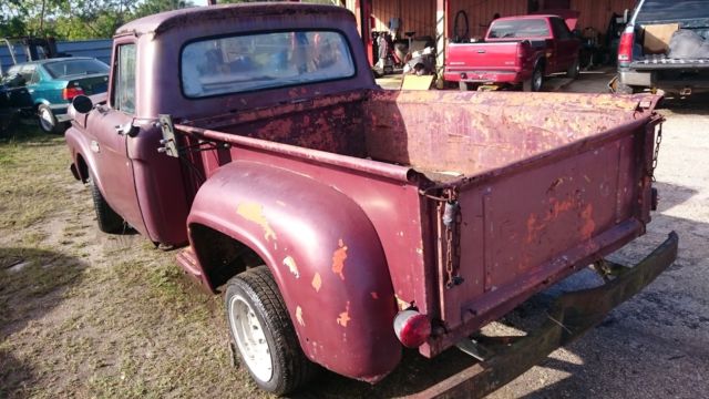 1965 rusty brown Ford F-100 Pickup Truck
