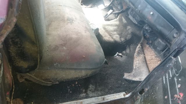 1965 rusty brown Ford F-100 Pickup Truck