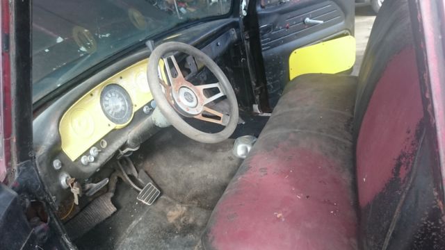1965 rusty brown Ford F-100 Pickup Truck