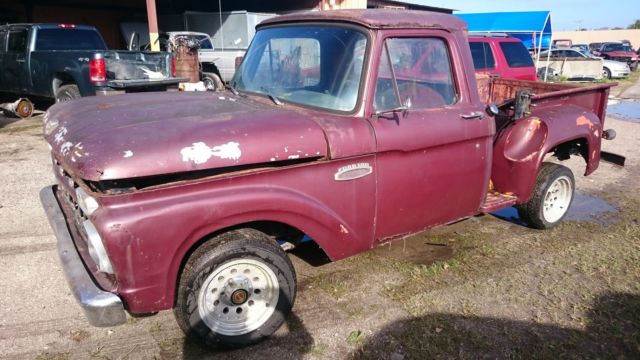 1965 rusty brown Ford F-100 Pickup Truck