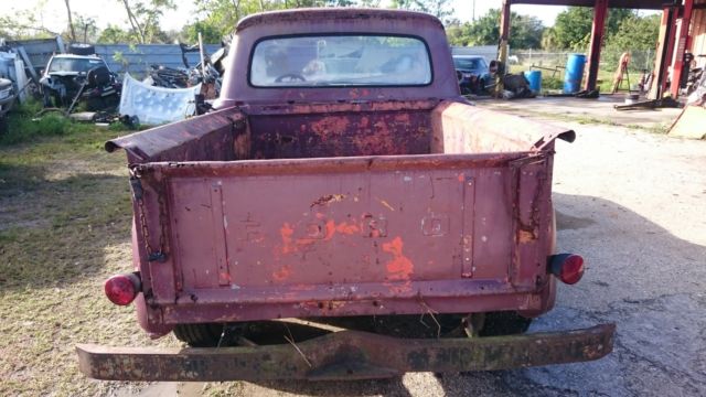 1965 rusty brown Ford F-100 Pickup Truck
