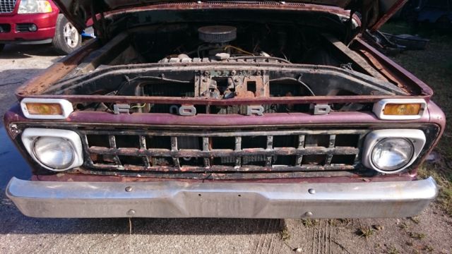 1965 rusty brown Ford F-100 Pickup Truck
