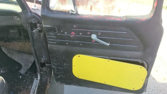 1965 rusty brown Ford F-100 Pickup Truck