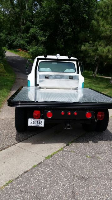 1964 Turquoise and white Ford F-250 Standard Cab Pickup