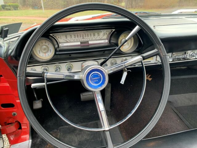 1964 Red with Black top Ford Galaxie Convertible
