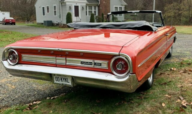 1964 Red with Black top Ford Galaxie Convertible