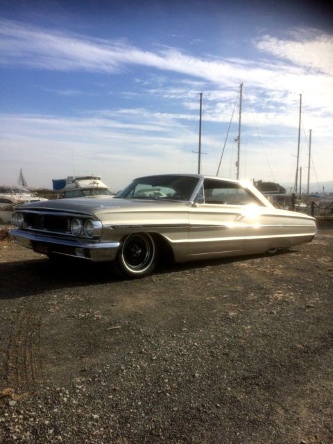 1964 champagne Ford Galaxie Coupe
