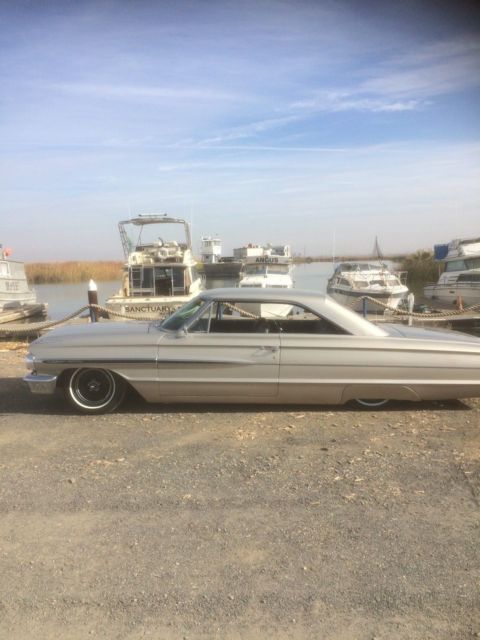 1964 champagne Ford Galaxie Coupe