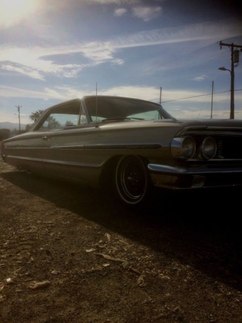 1964 champagne Ford Galaxie Coupe