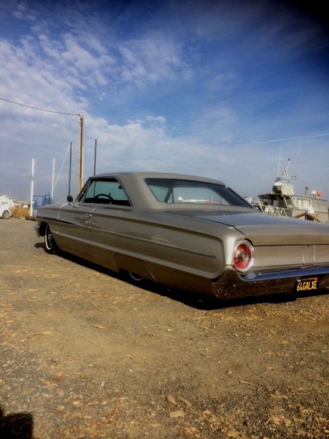 1964 champagne Ford Galaxie Coupe