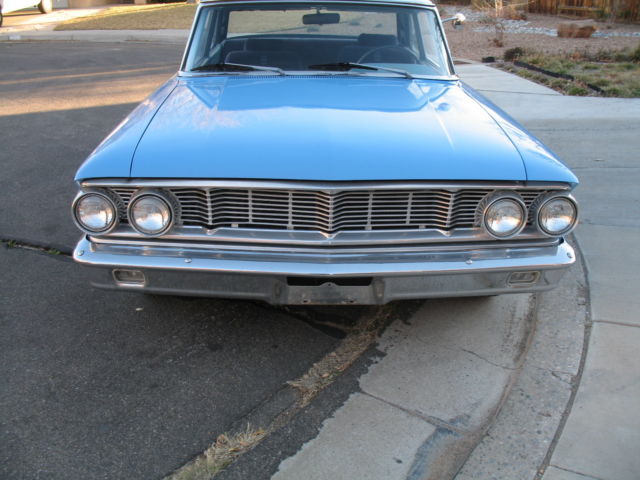 1964 blue and white Ford Galaxie