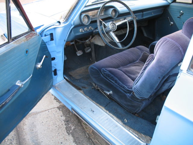 1964 blue and white Ford Galaxie