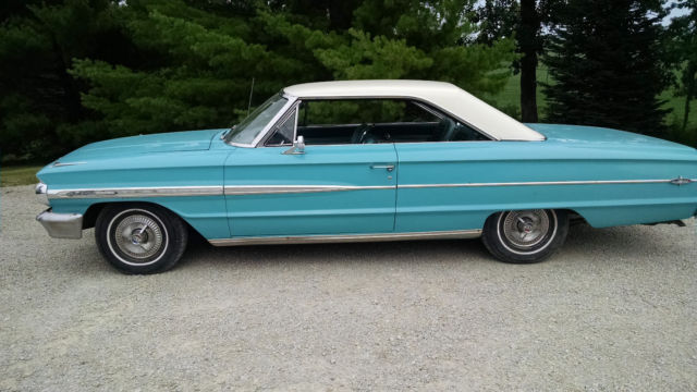 1964 teal and white Ford Galaxie