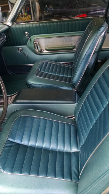 1964 teal and white Ford Galaxie