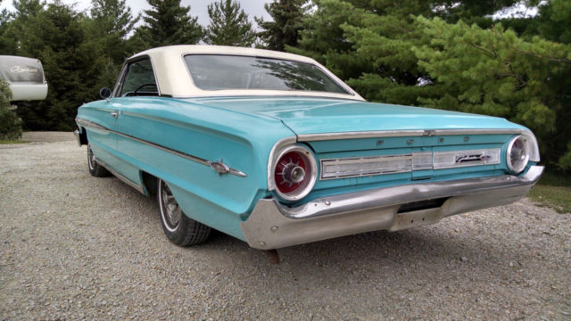 1964 teal and white Ford Galaxie