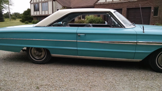 1964 teal and white Ford Galaxie