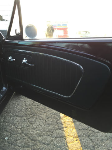 1964 Burgundy Ford Mustang Coupe