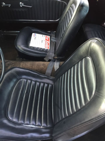 1964 Burgundy Ford Mustang Coupe