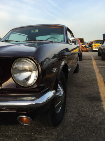 1964 Burgundy Ford Mustang Coupe