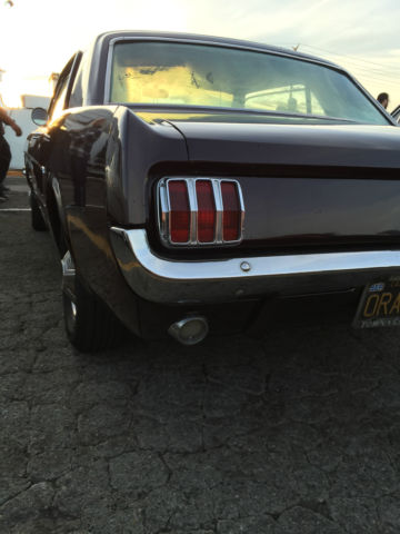 1964 Burgundy Ford Mustang Coupe