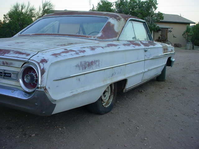 1964 Red with white top and trim Ford Galaxie 4 door