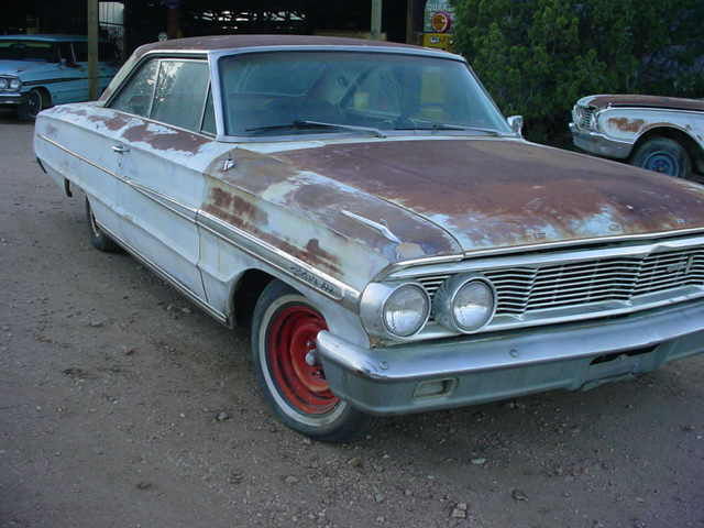 1964 Red with white top and trim Ford Galaxie 4 door