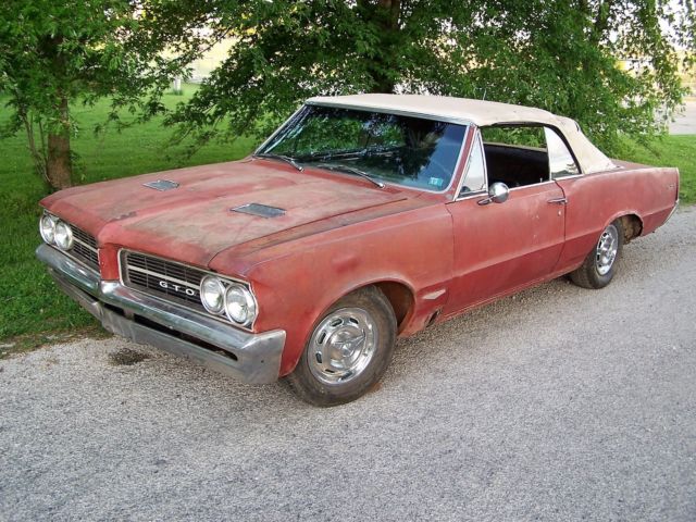 1964 sunfire red Pontiac GTO