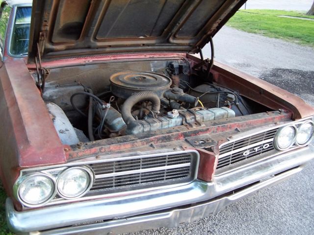 1964 sunfire red Pontiac GTO