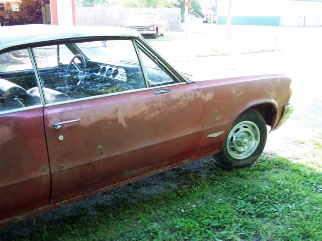 1964 sunfire red Pontiac GTO