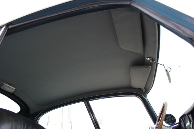 1964 light blue Jaguar E-Type Coupe