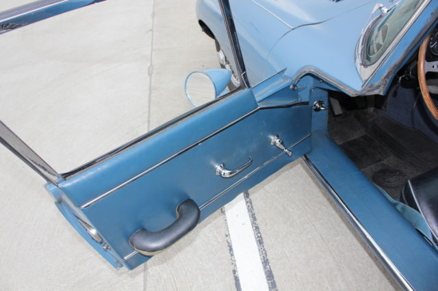 1964 light blue Jaguar E-Type Coupe