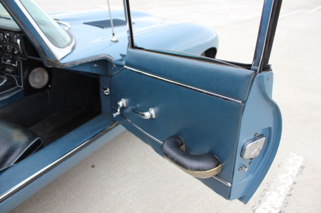 1964 light blue Jaguar E-Type Coupe