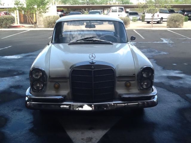1964 White Mercedes-Benz 200-Series Sedan
