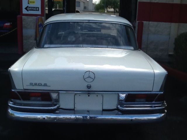 1964 White Mercedes-Benz 200-Series Sedan
