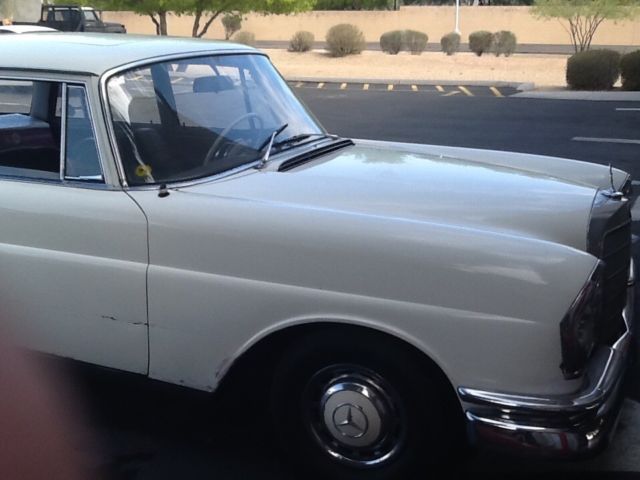 1964 White Mercedes-Benz 200-Series Sedan