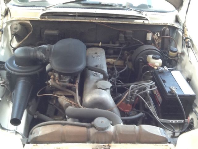 1964 White Mercedes-Benz 200-Series Sedan