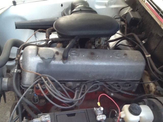 1964 White Mercedes-Benz 200-Series Sedan