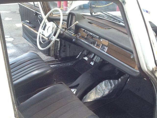 1964 White Mercedes-Benz 200-Series Sedan