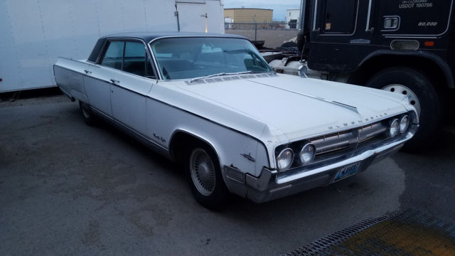 1964 White Oldsmobile Ninety-Eight Sedan