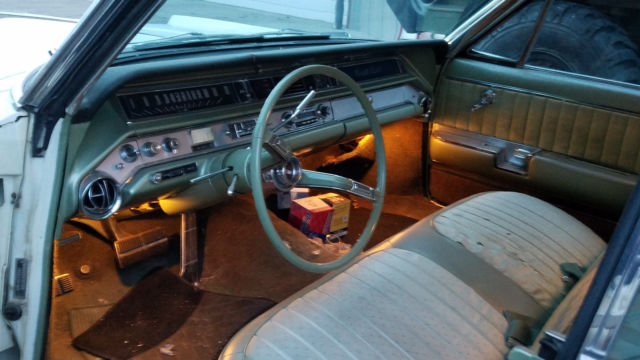 1964 White Oldsmobile Ninety-Eight Sedan