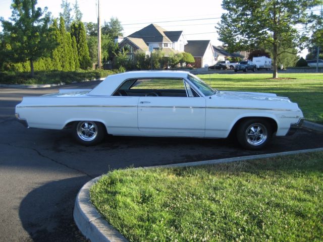 1964 Pearl White Oldsmobile Eighty-Eight Coupe