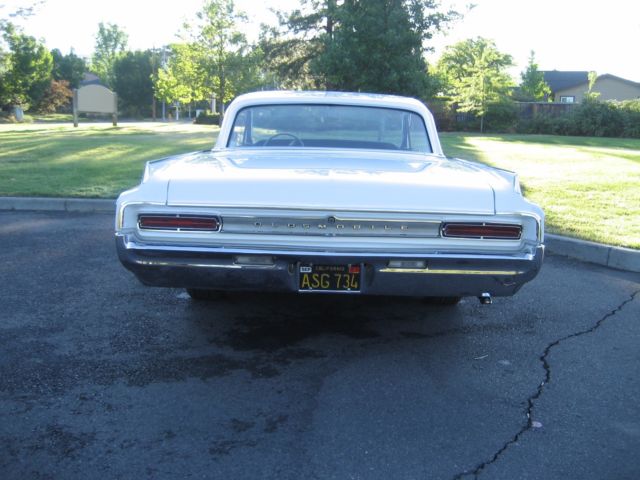 1964 Pearl White Oldsmobile Eighty-Eight Coupe