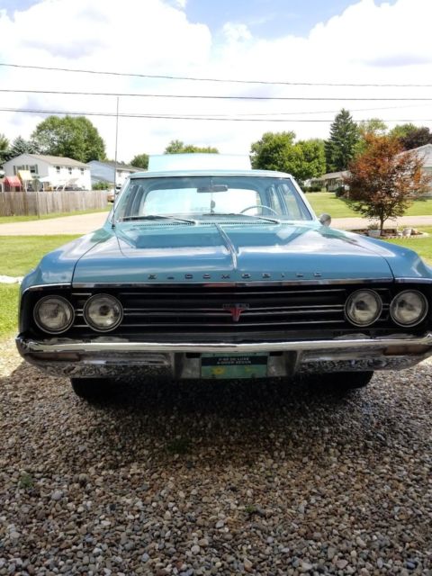 1964 Teal blue Oldsmobile Cutlass Sedan